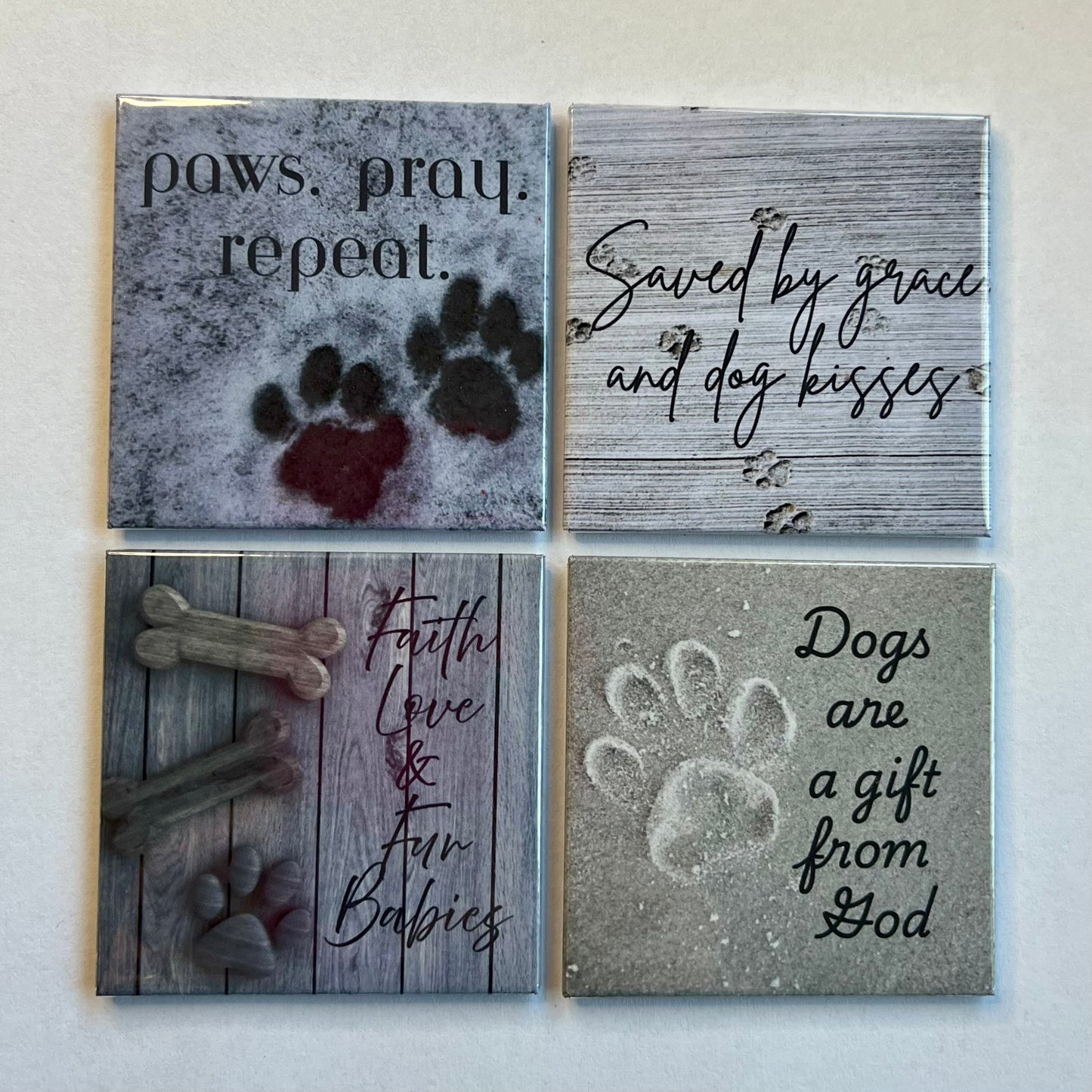 Set of four Dog and Faith Christian magnets displayed on a white background