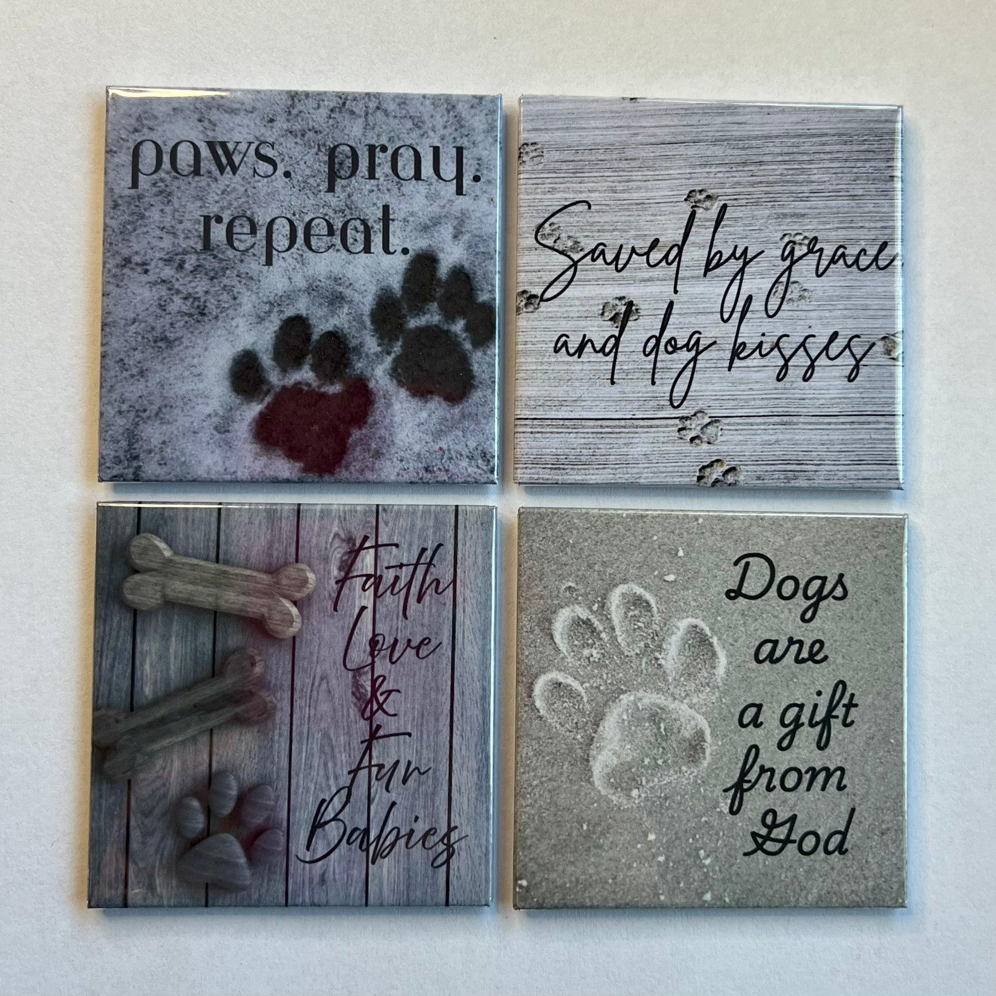 Set of four Dog and Faith Christian magnets displayed on a white background