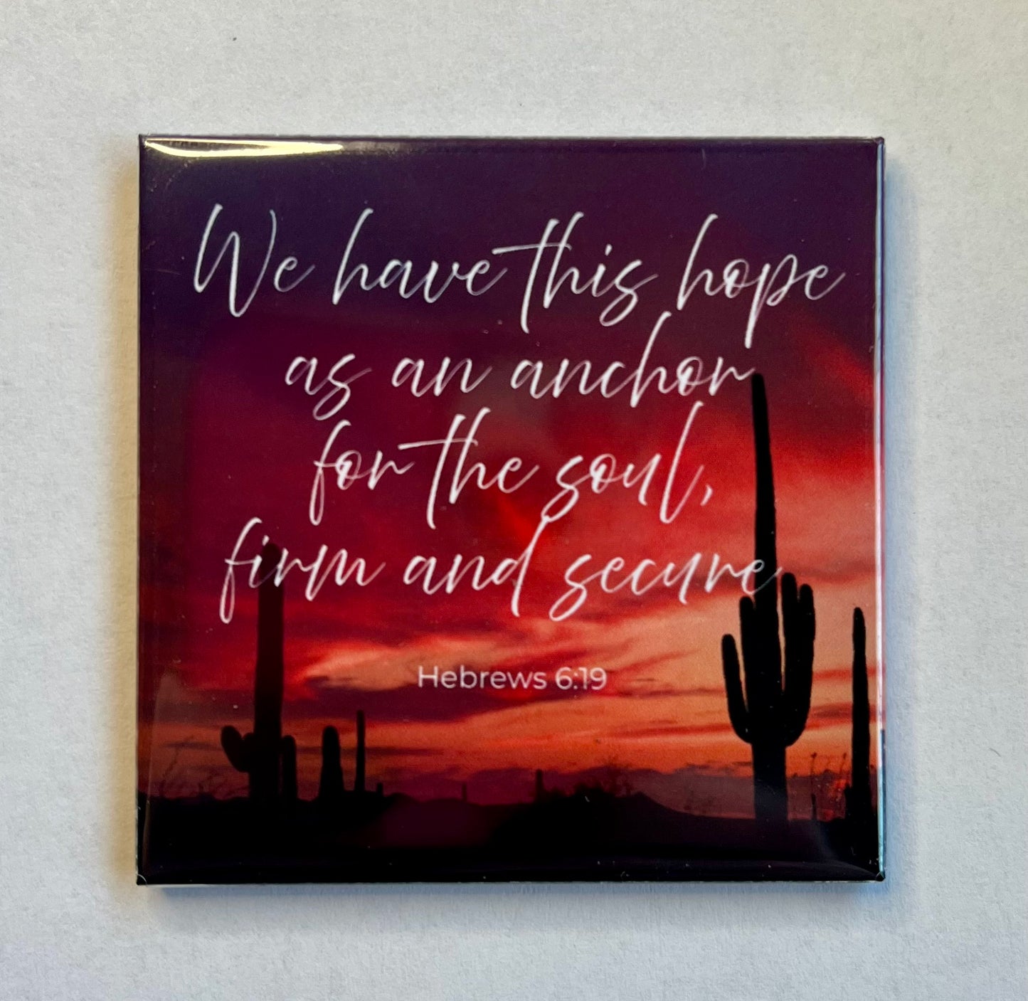 Christian magnet with desert sunset and saguaro silhouettes featuring Hebrews 6:19 about hope as an anchor for the soul
