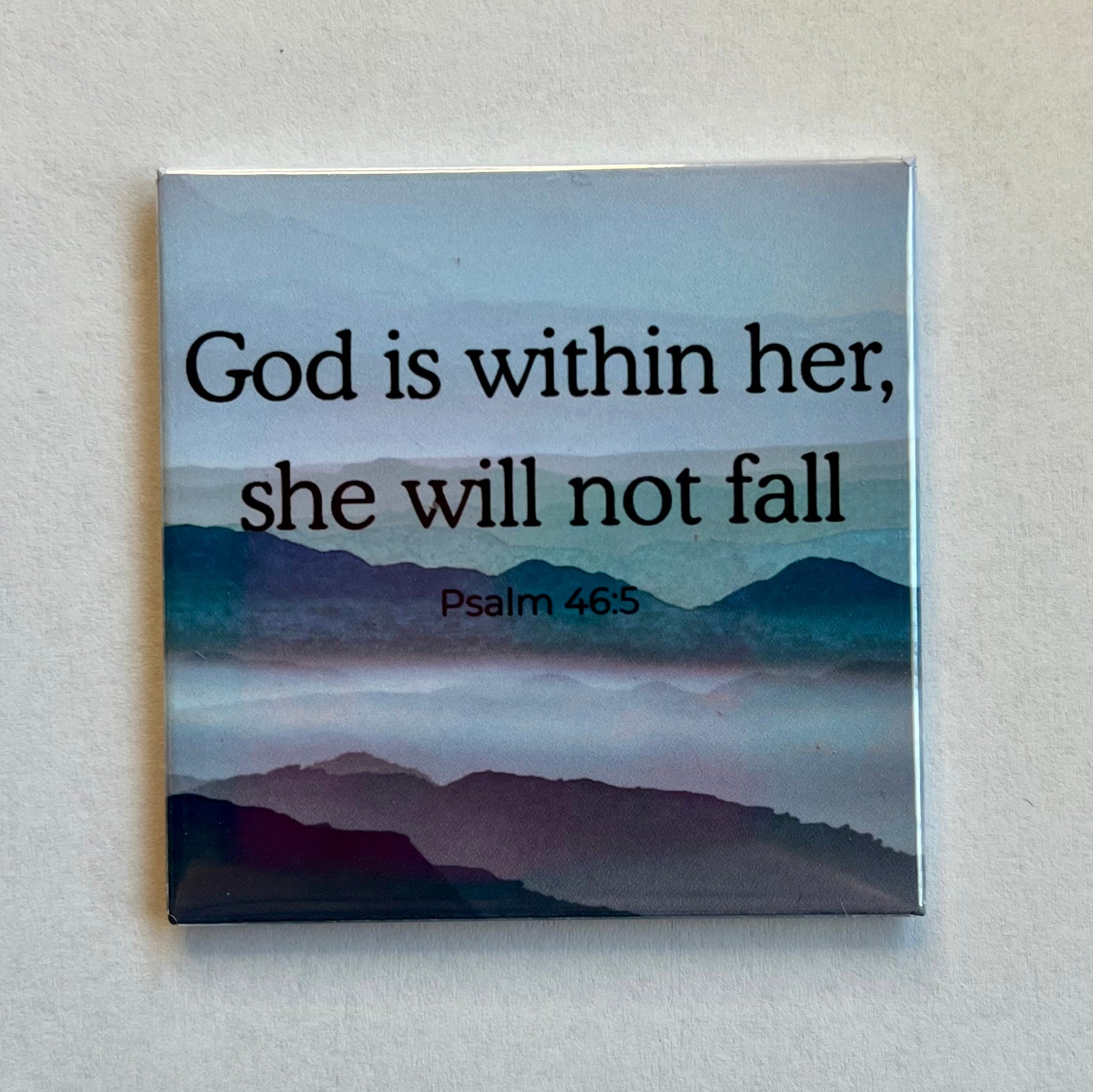Christian scripture magnet with gray and blue mountain scene featuring Psalm 46:5 God Is Within Her She Will Not Fall