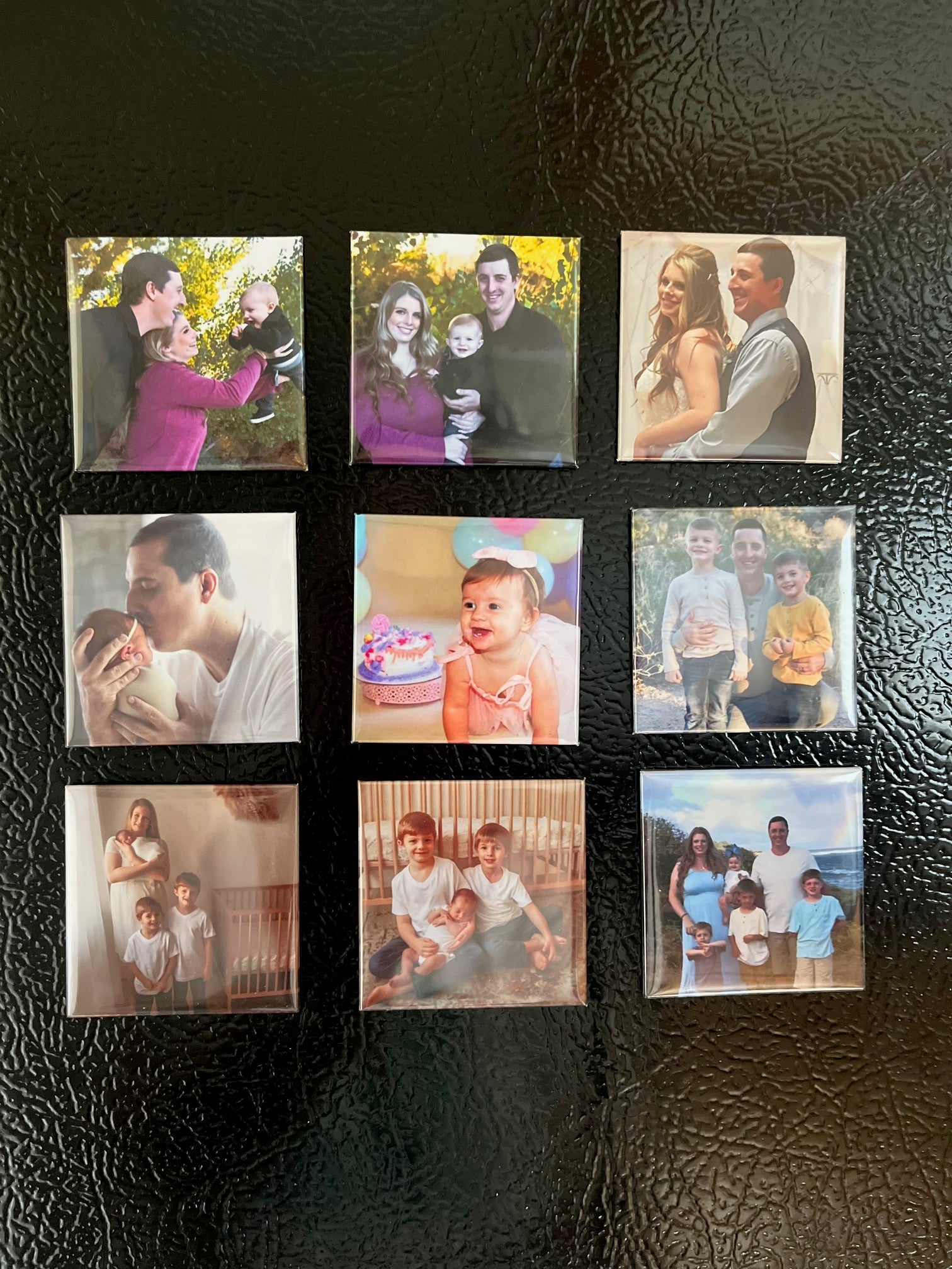 Set of 9 personalized photo magnets on a fridge showing family, newborn, and random family moments
