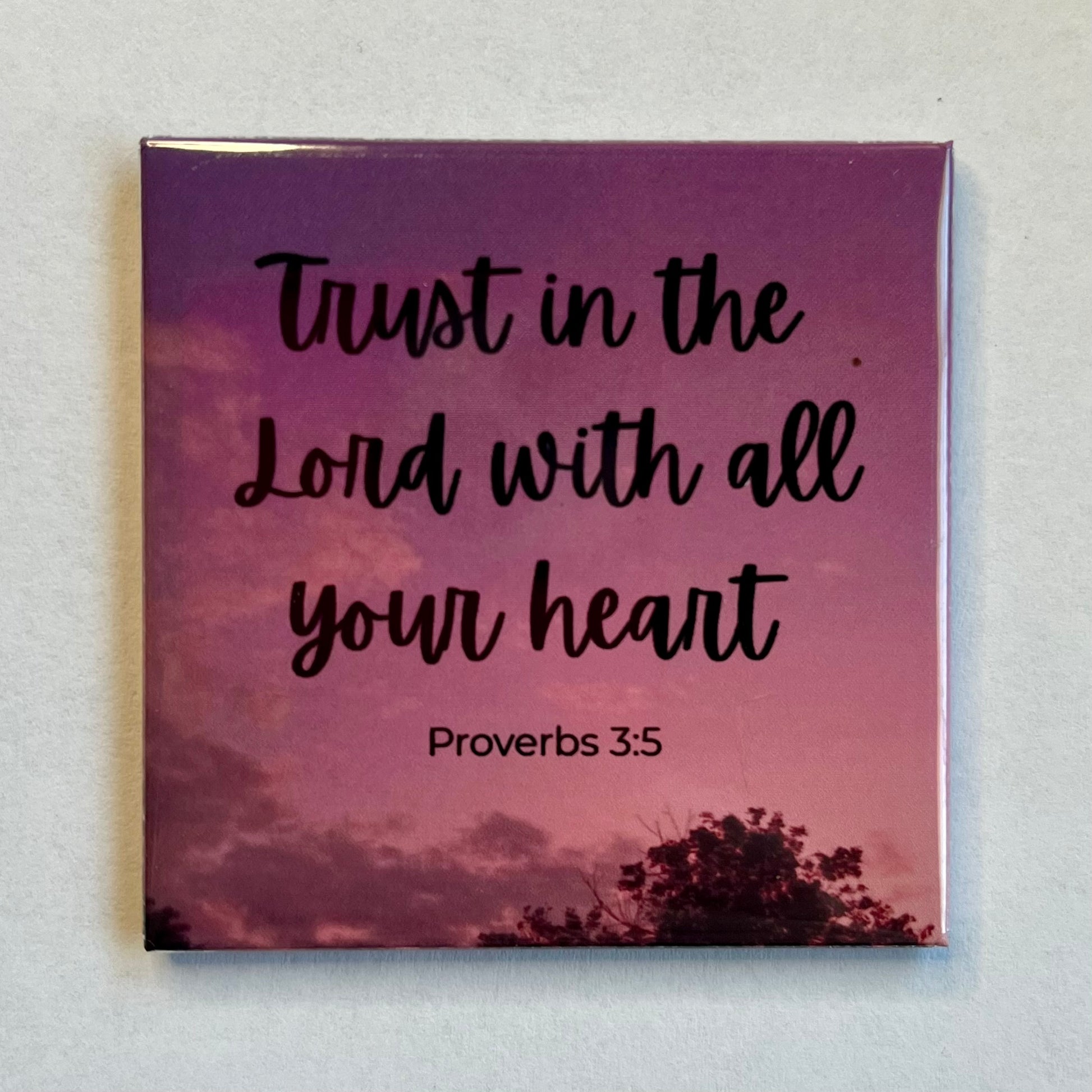 Christian scripture magnet with pink and purple sunset reading Trust in the Lord with All Your Heart Proverbs 3:5
